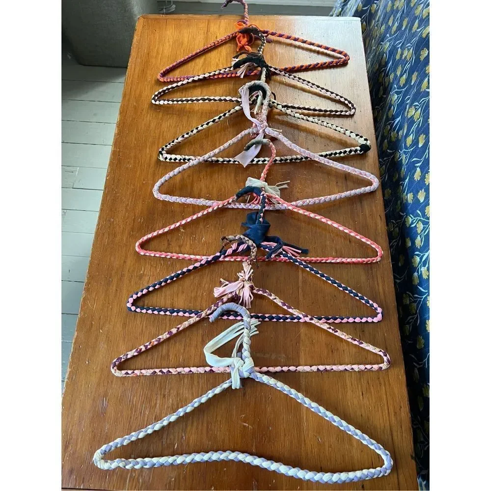 Bundle of vintage woven multicolor hangers